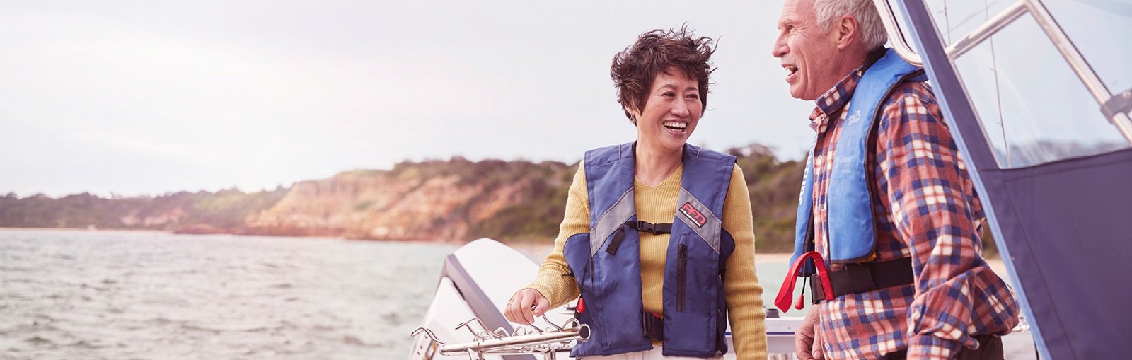 elderly couple on boat