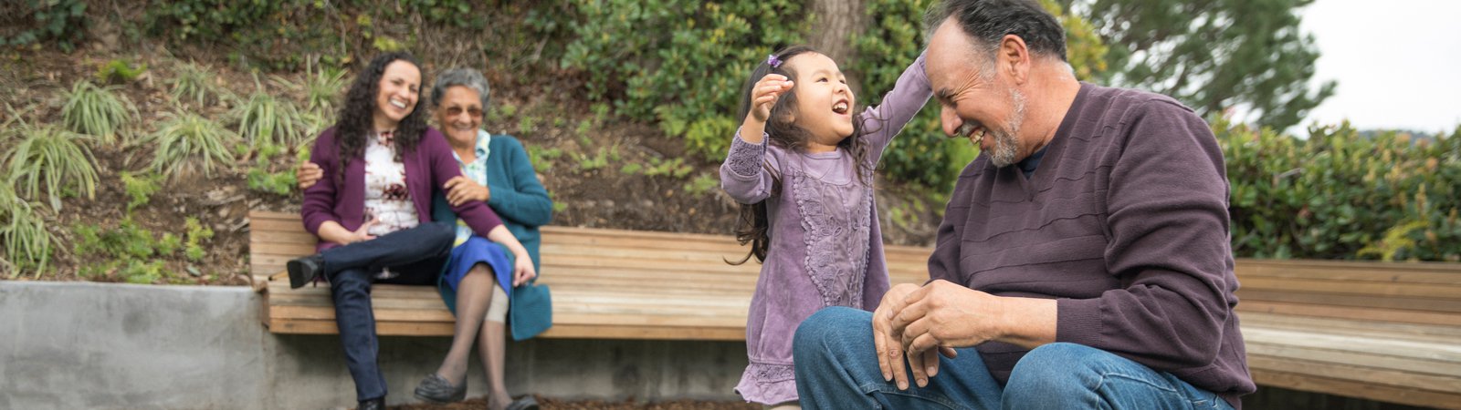 Kid playing with grandfather