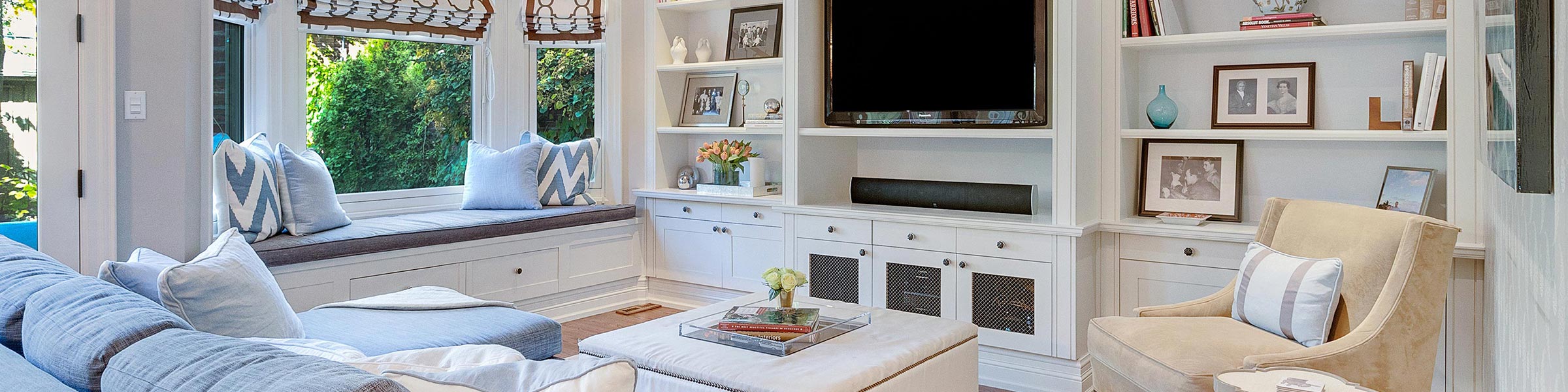 White lounge with a garden window